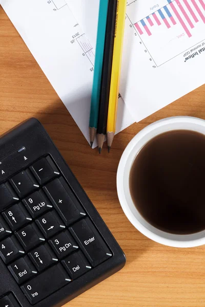 Office desk with coffee cup — Stock Photo, Image