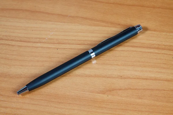 Pen on wood — Stock Photo, Image
