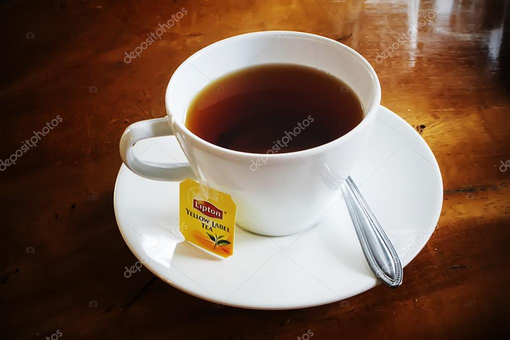 Bangkok, Thailand - Aug. 11, 2014: Lipton Tea cup on table. The Lipton  Brand was named after its founder Thomas Lipton. – Stock Editorial Photo ©  pixindy #54503871