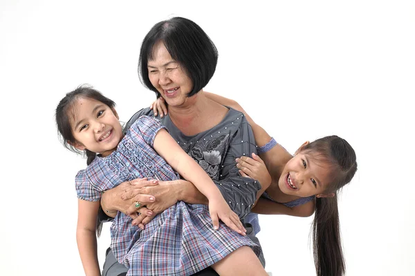 Grootmoeder met haar kleinkinderen — Stockfoto