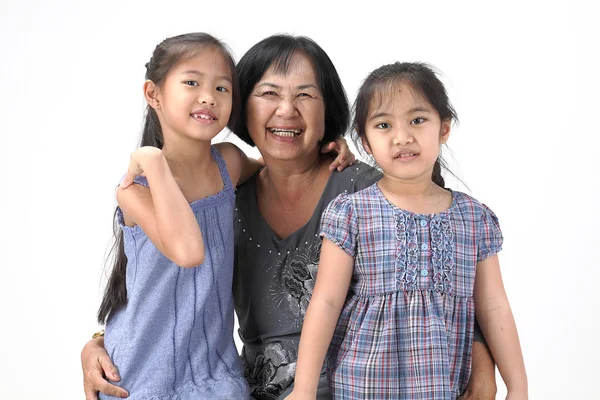 Grootmoeder met haar kleinkinderen — Stockfoto