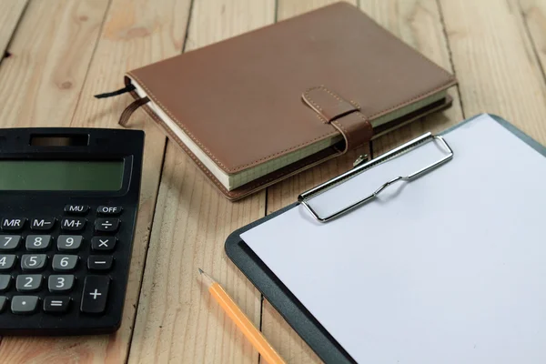 Notebook on wood background — Stock Photo, Image