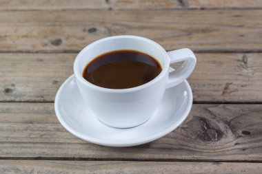 Beyaz tahta üzerine kahve fincan