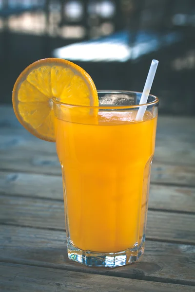 Orange juice glass with slice orange — Stock Photo, Image