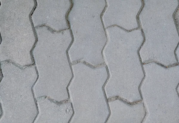 Ladrillo piso textura gris hormigón ladrillo ondas patrón gráfico resurge — Foto de Stock
