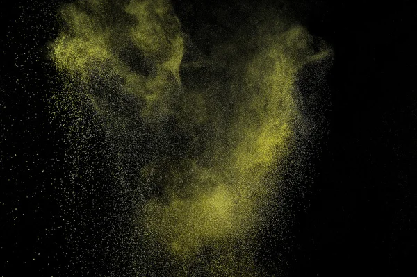 Esplosione polvere d'oro su sfondo nero . — Foto Stock