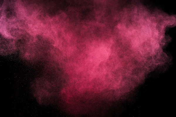 Explosion de poudre Magenta sur fond noir . — Photo