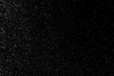 Siyah arkaplanda soyut su sıçramaları.