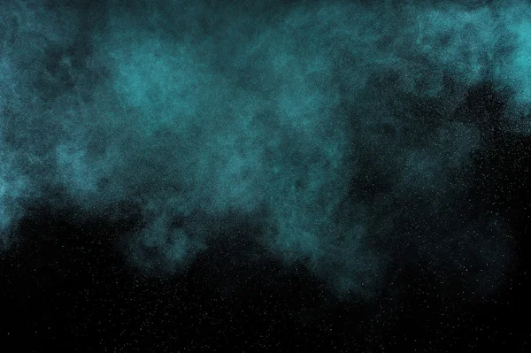 Aquamarine  powder explosion on black background. — Stock Photo, Image