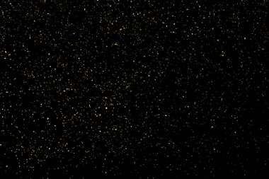 Siyah Arkaplan 'da izole edilmiş altın parıltılı doku. Altın yıldız tozu. Amber Parçacık Rengi. Parıltı Yağmuru. Vektör İllüstrasyonu, Eps 10.