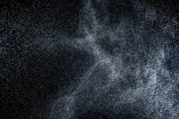 Siyah arkaplanda soyut su sıçramaları