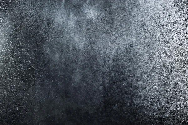 Siyah arkaplanda soyut su sıçramaları