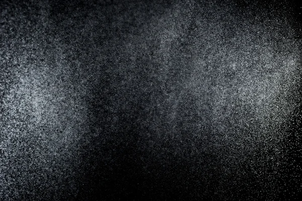 Siyah arkaplanda soyut su sıçramaları