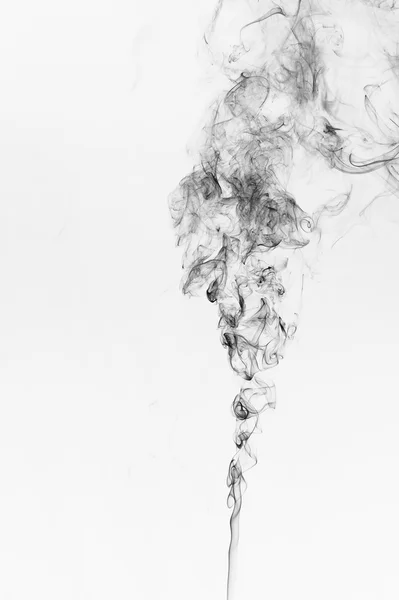 Abstrakter schwarzer Rauch auf weißem Hintergrund. — Stockfoto