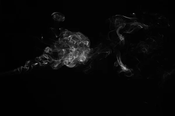 Abstract rook op een zwarte achtergrond. — Stockfoto
