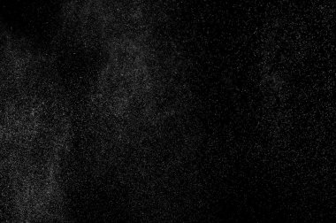 Siyah arkaplanda soyut su sıçramaları.