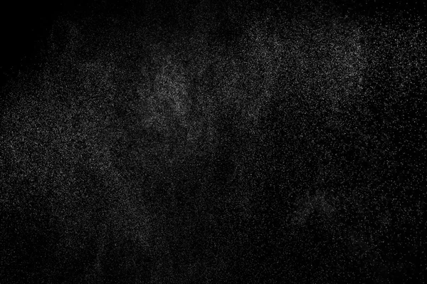 Salpicos abstratos de água sobre um fundo preto. — Fotografia de Stock