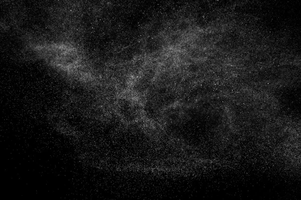 Abstrakt stänk av vatten på en svart bakgrund. — Stockfoto