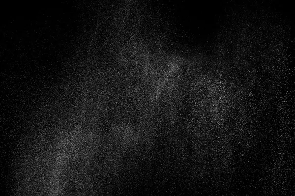 Siyah arkaplanda soyut su sıçramaları.