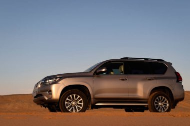 Toyota Land Cruiser Prado standing in the middle of the desert 15.06.2021. Walvis Bay, Namibia. Africa 