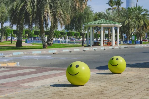 Concrete Yellow Restrictive Spheres Funny Smiley Face Indicating Entry Pedestrian — Stock Photo, Image