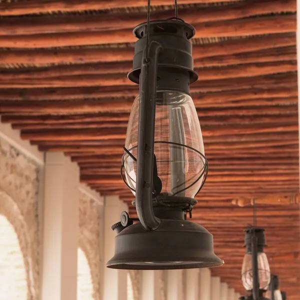 Selective Focus Vintage Repaired Black Gasoline Lantern Hanging Blurred Corridor — Stock Photo, Image