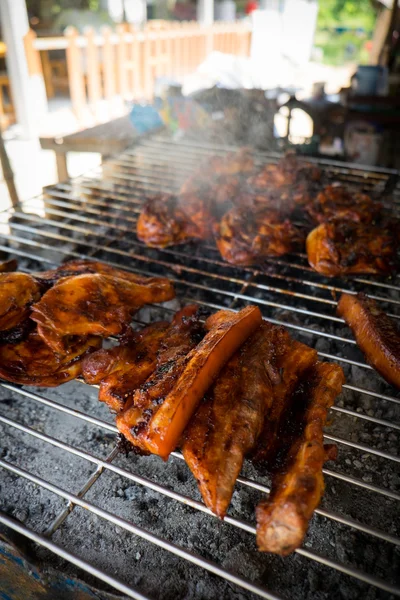 Roast chicken leg on grill — Stock Photo, Image