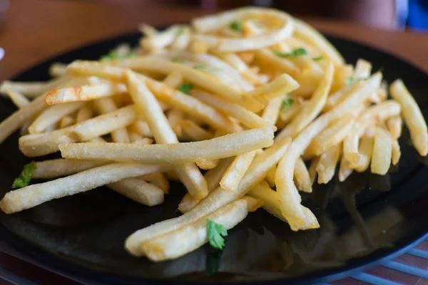 Patatine fritte con prezzemolo — Foto Stock