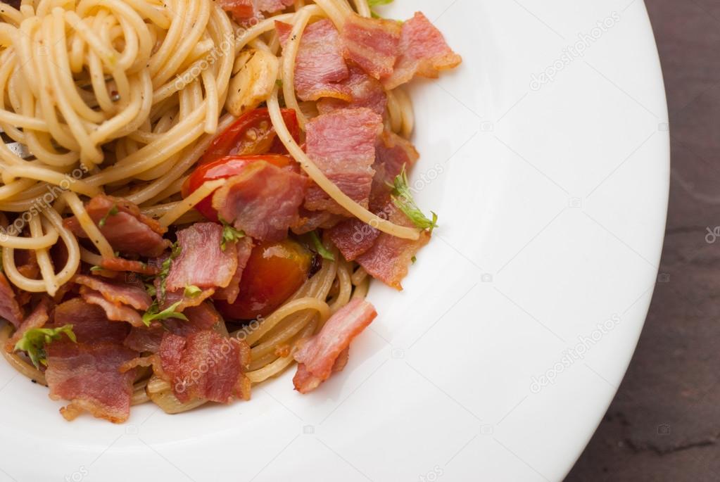 Spaghetti with dried chilli ,bacon and garlic.