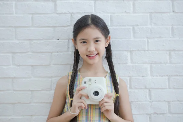 Lovely Asian girl holding camera for take a photo — Stock Photo, Image