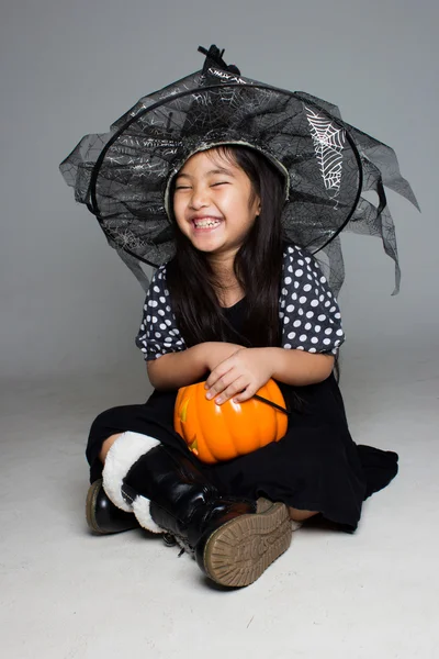 Asian girl  in witch costume — Stock Photo, Image