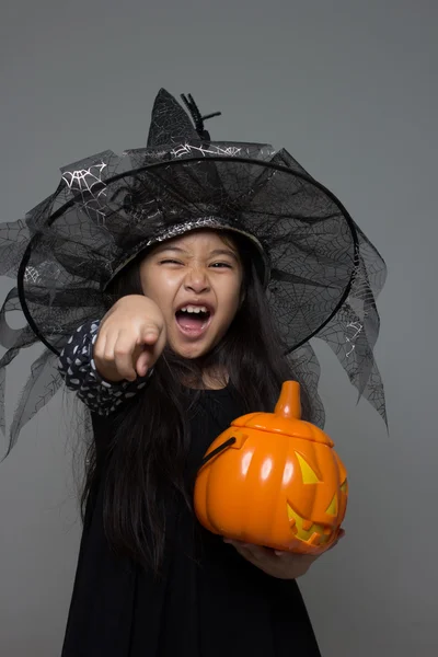 Asian girl with pumpkin — Stock Photo, Image