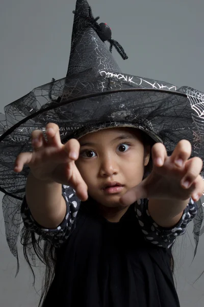 Asian girl in witch hat — Stock Photo, Image