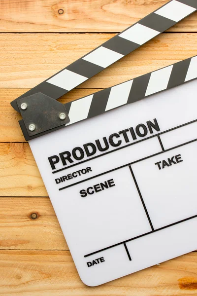 Movie slate film on wooden table — Stock Photo, Image