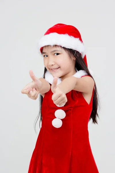 亚洲女孩在圣诞老人的帽子 — 图库照片