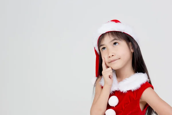 Asian girl in red Santa hat — Stock Photo, Image