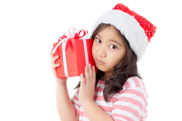 Little Asian girl in Santa hat and red gift box isolated on white — Stock Photo, Image