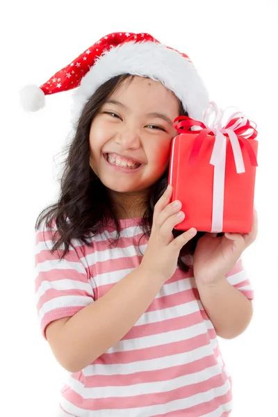 Little Asian girl in Santa hat and red gift box isolated on white — Stock Photo, Image