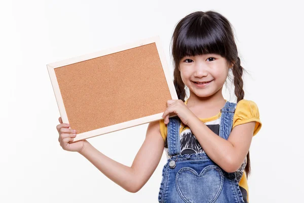 Little Asian child with empty board — Stock Photo, Image