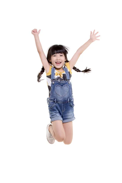 Mutlu küçük Asyalı çocuk atlama — Stok fotoğraf