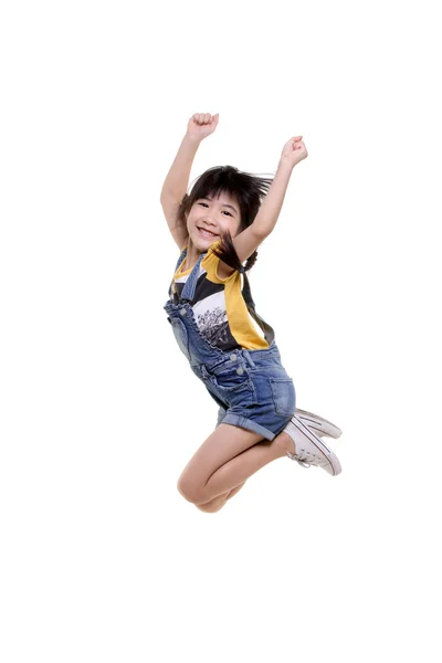 Happy little Asian child jumping — Stock Photo, Image