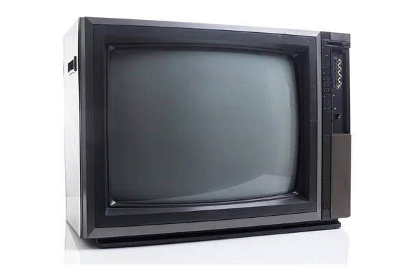 Винтажное телевидение с тенью на белом — стоковое фото