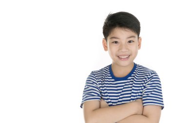 Asya mutlu çocuk gülümsemek yüz ve kameraya bakarak portre 