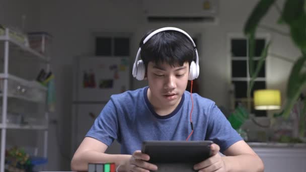 Teenage Boy Playing Online Games Joyfully Night His House — Stock Video