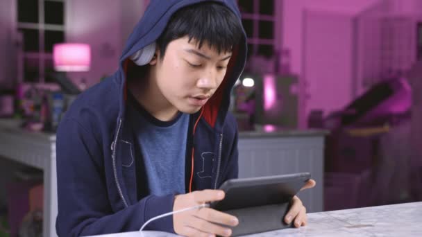 Teenage Boy Playing Online Games Joyfully Night His House — Stock Video