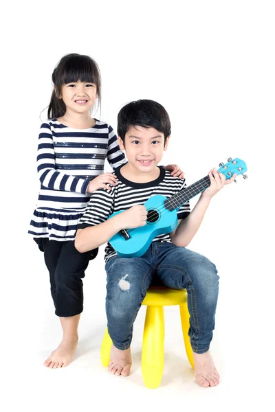 Little asian child with akulele — Stock Photo, Image