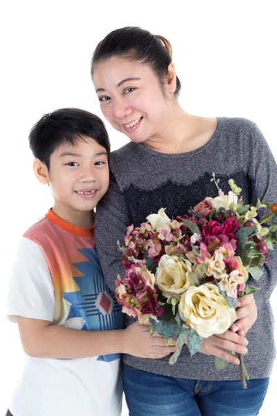 Little asian child with bouquet in hand and mother — Stock Photo, Image