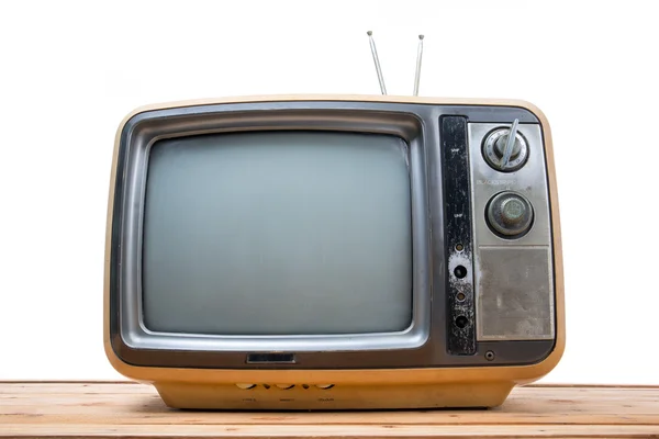 Vintage Tv na dřevěný stůl — Stock fotografie