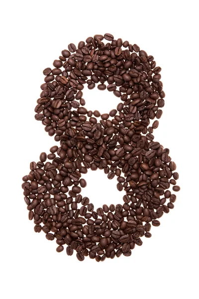 Geröstete Kaffeebohnen in Form der Zahl acht — Stockfoto