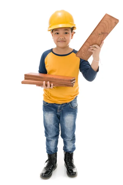 Young asian child construction Worker Holding equipment — Stok Foto